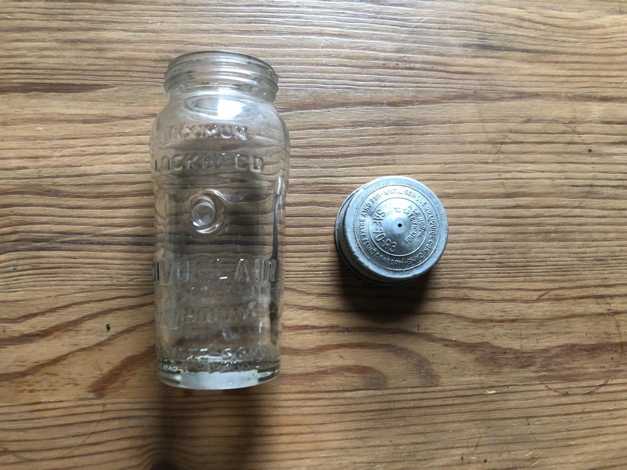 Bocal liquide de frein en verre "Nivoclair" LesAnciennes.com