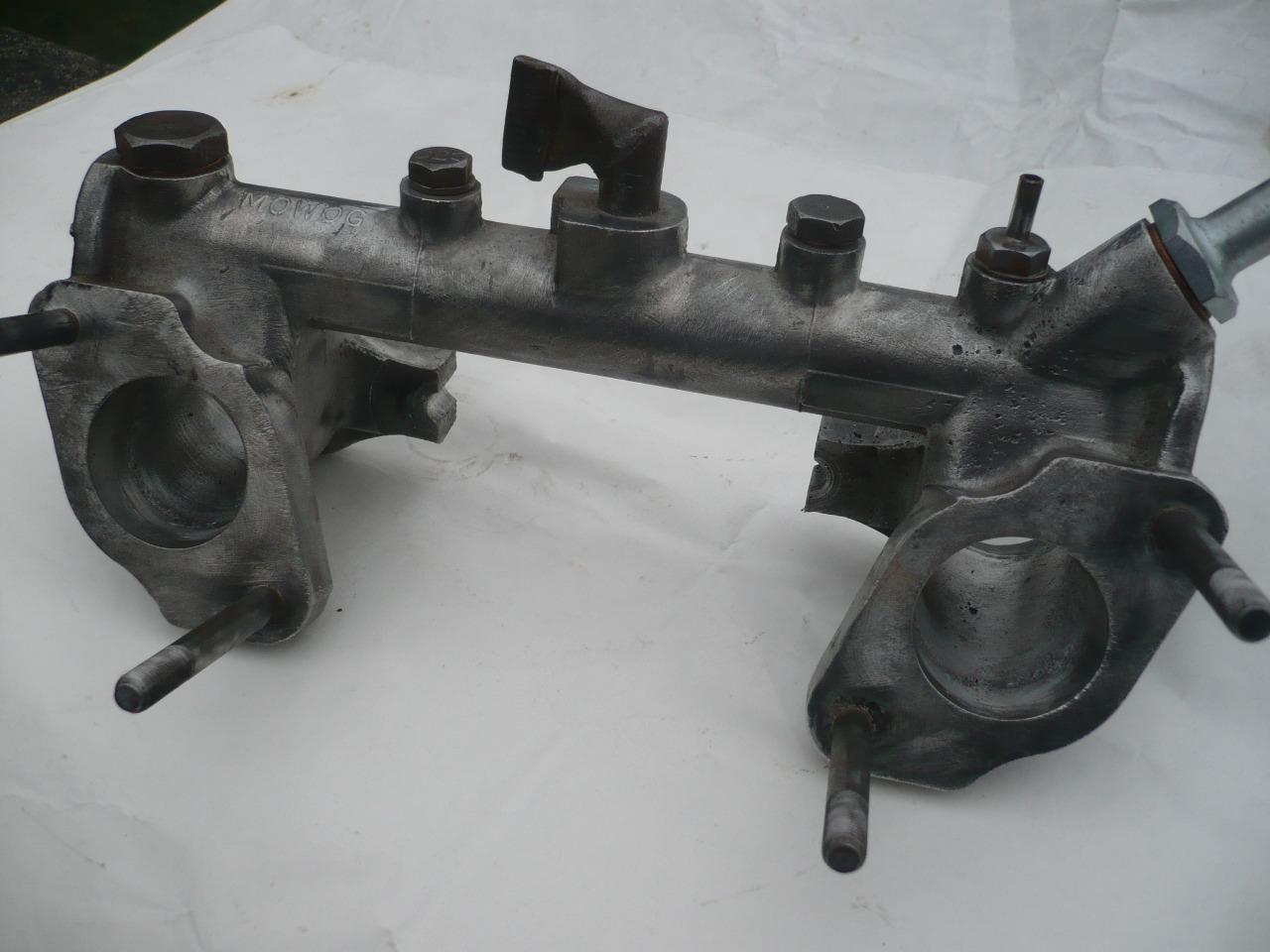 Pièces MG MGB ( collecteur d'admission ) LesAnciennes.com