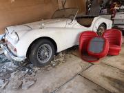 image_0-TRIUMPH TR3A Interieur rouge - 1957