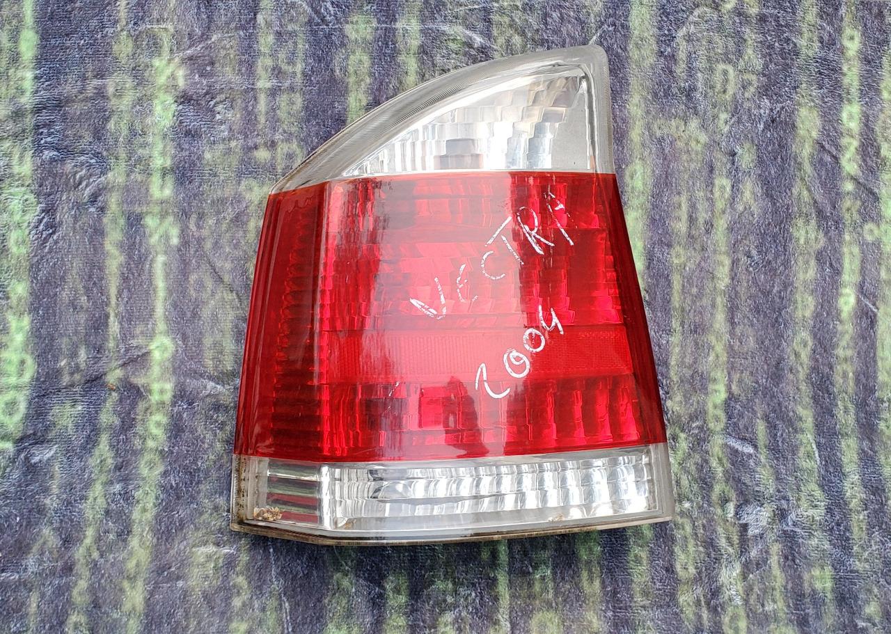 Feu arrière gauche conducteur OPEL VECTRA C (2004) LesAnciennes.com