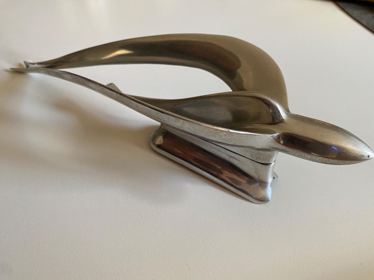 Mascotte SIMCA Hirondelle LesAnciennes.com