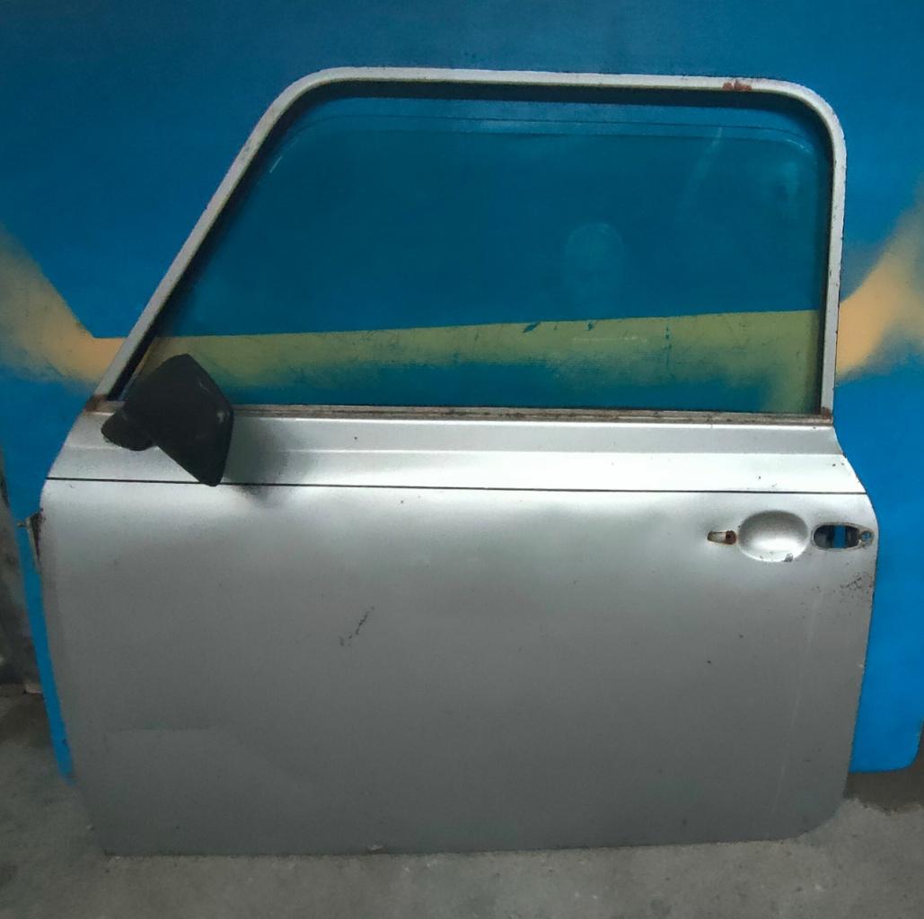 Porte Gauche, complète. LesAnciennes.com