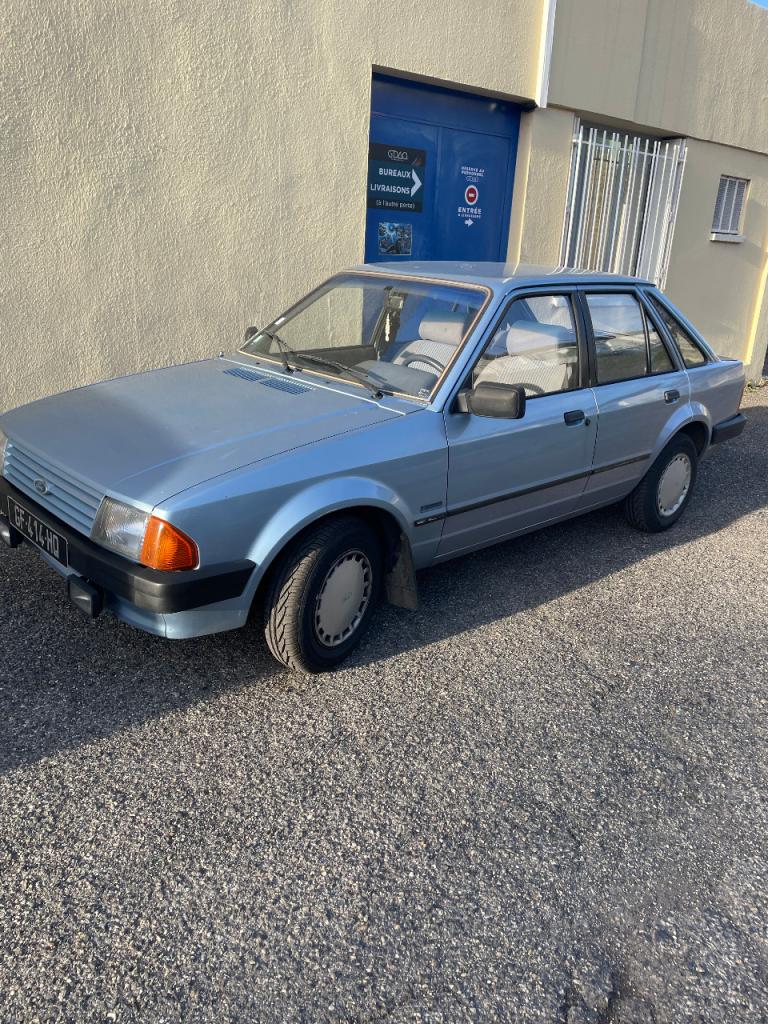 FORD Escort 1,3i LASER - 1984 LesAnciennes.com