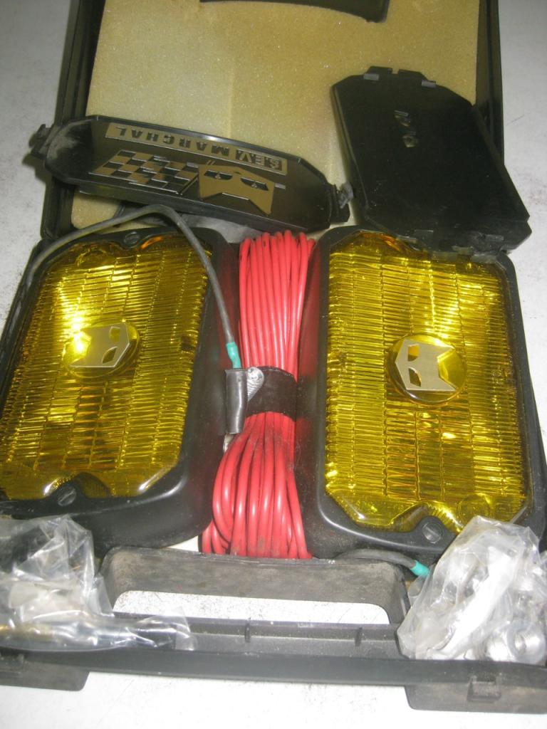 Paire projecteurs Marchal 6/1978, Neufs. LesAnciennes.com