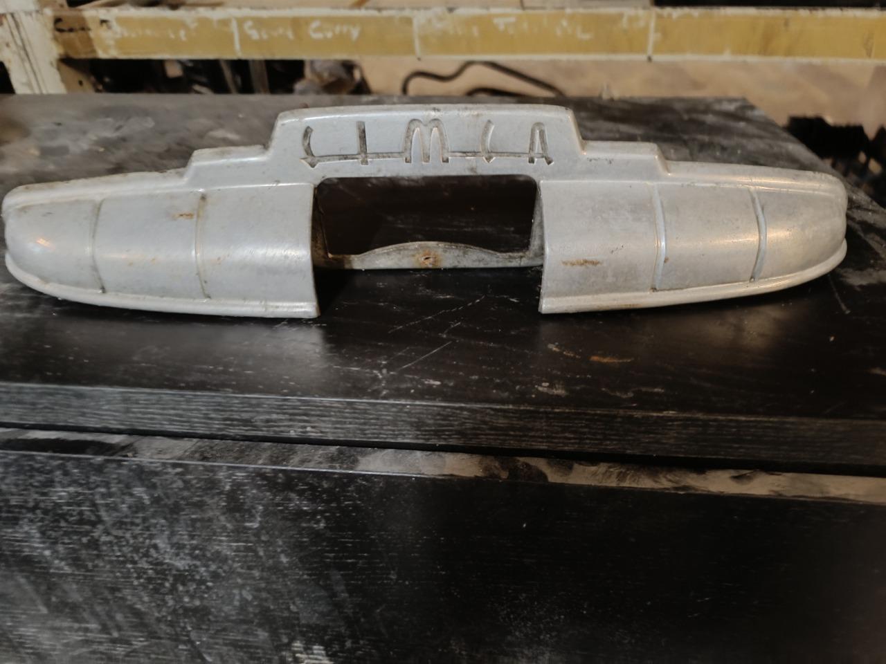 Poignée de coffre LesAnciennes.com