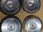 image_1-4 Enjoliveurs Peugeot 204