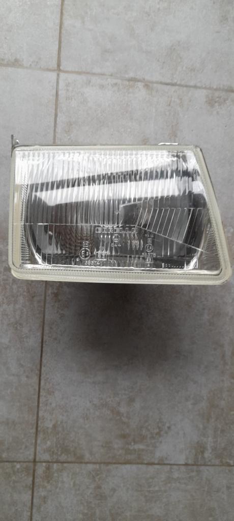 FORD Escort mk3 phare neuf LesAnciennes.com