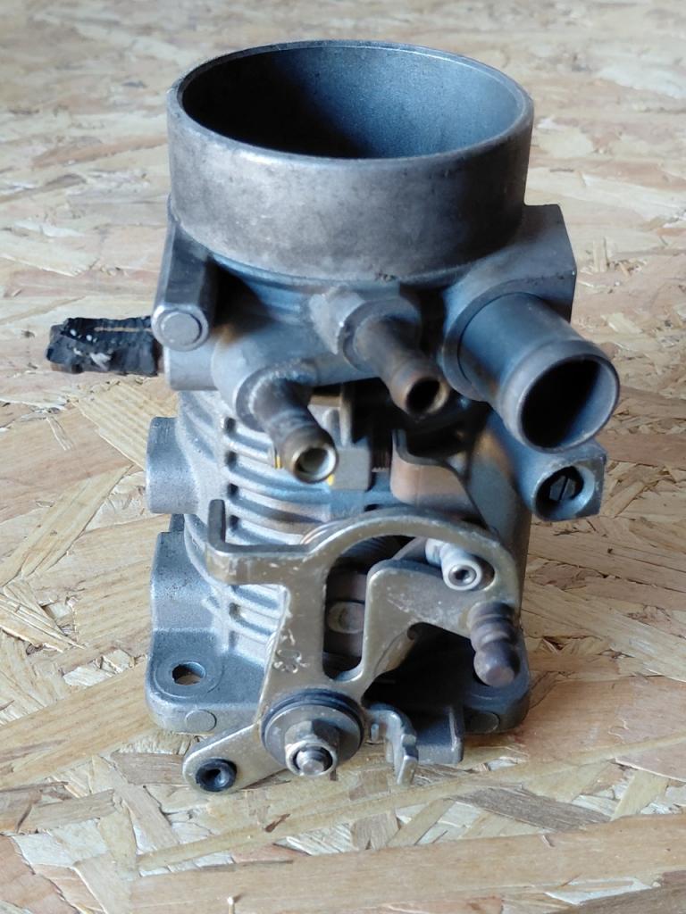 Boitier papillon OPEL Kadett GSI LesAnciennes.com