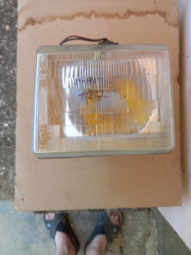 Phare G FIAT 127 LesAnciennes.com