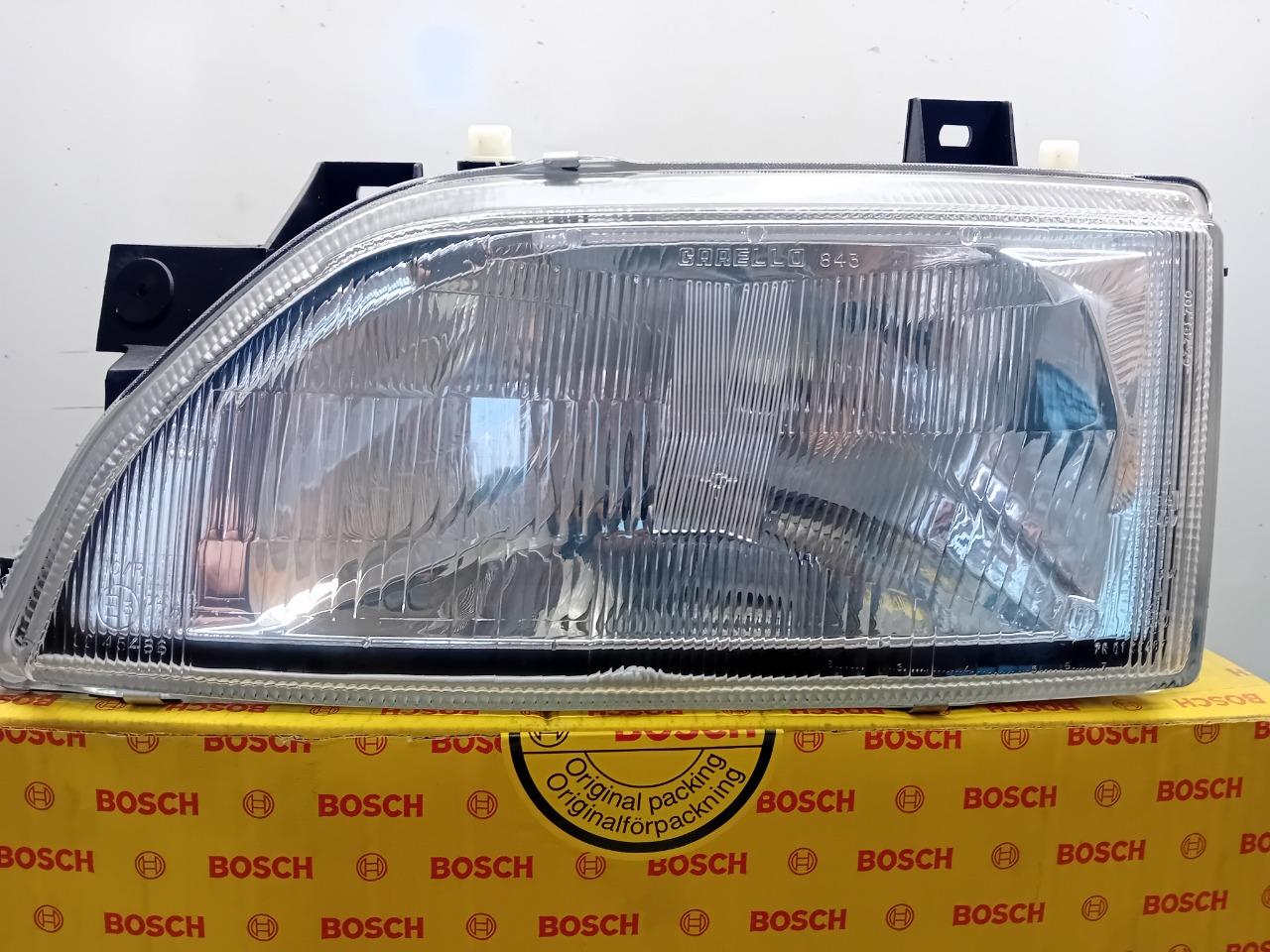 0318042313 PHARE AVANT GAUCHE FORD ESCORT MK5 LesAnciennes.com