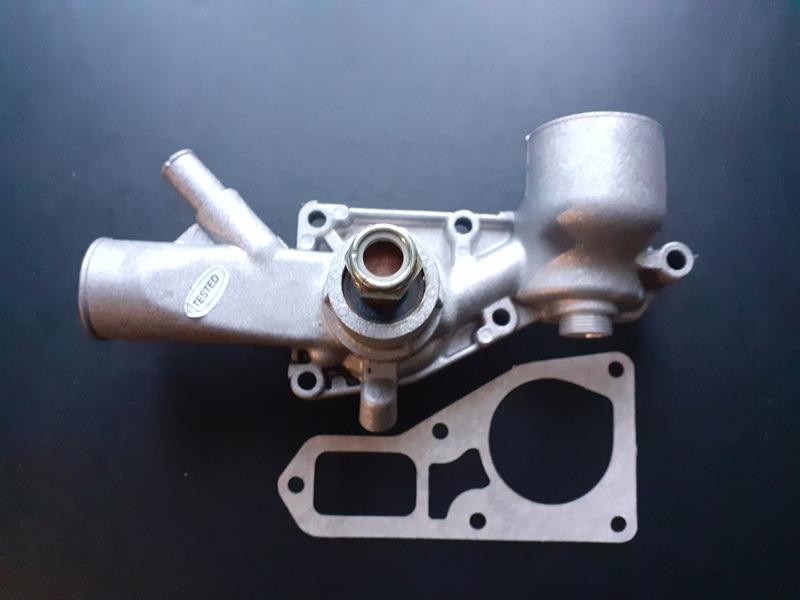 Pompe à eau PEUGEOT 404 LesAnciennes.com