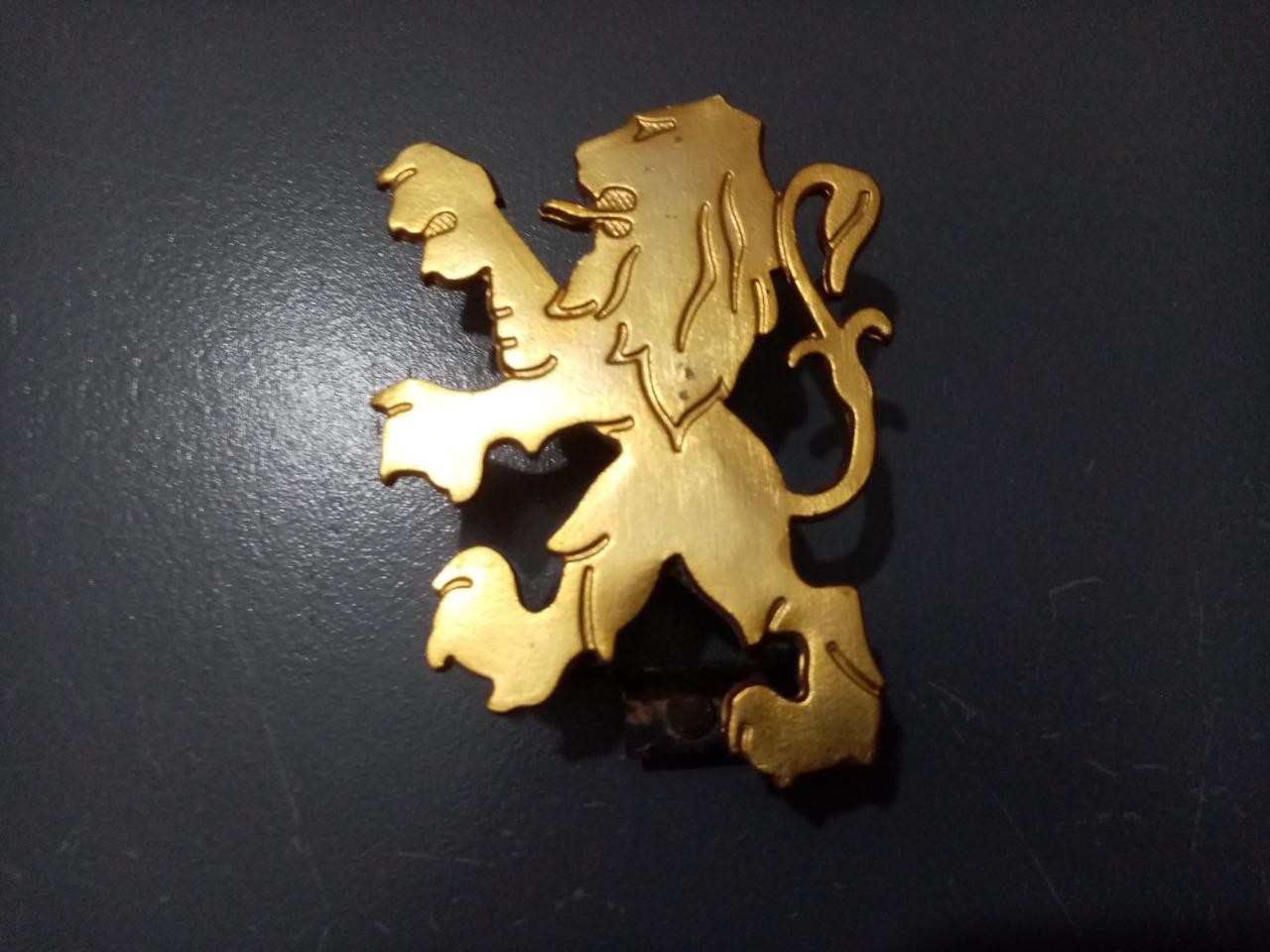 Lion PEUGEOT de calandre LesAnciennes.com