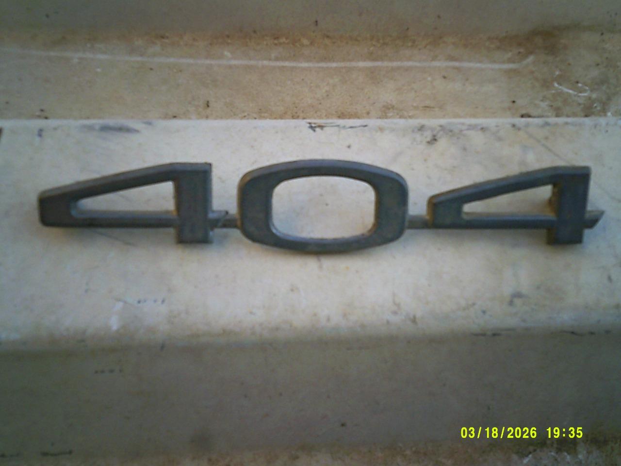 Monogramme PEUGEOT 404 LesAnciennes.com