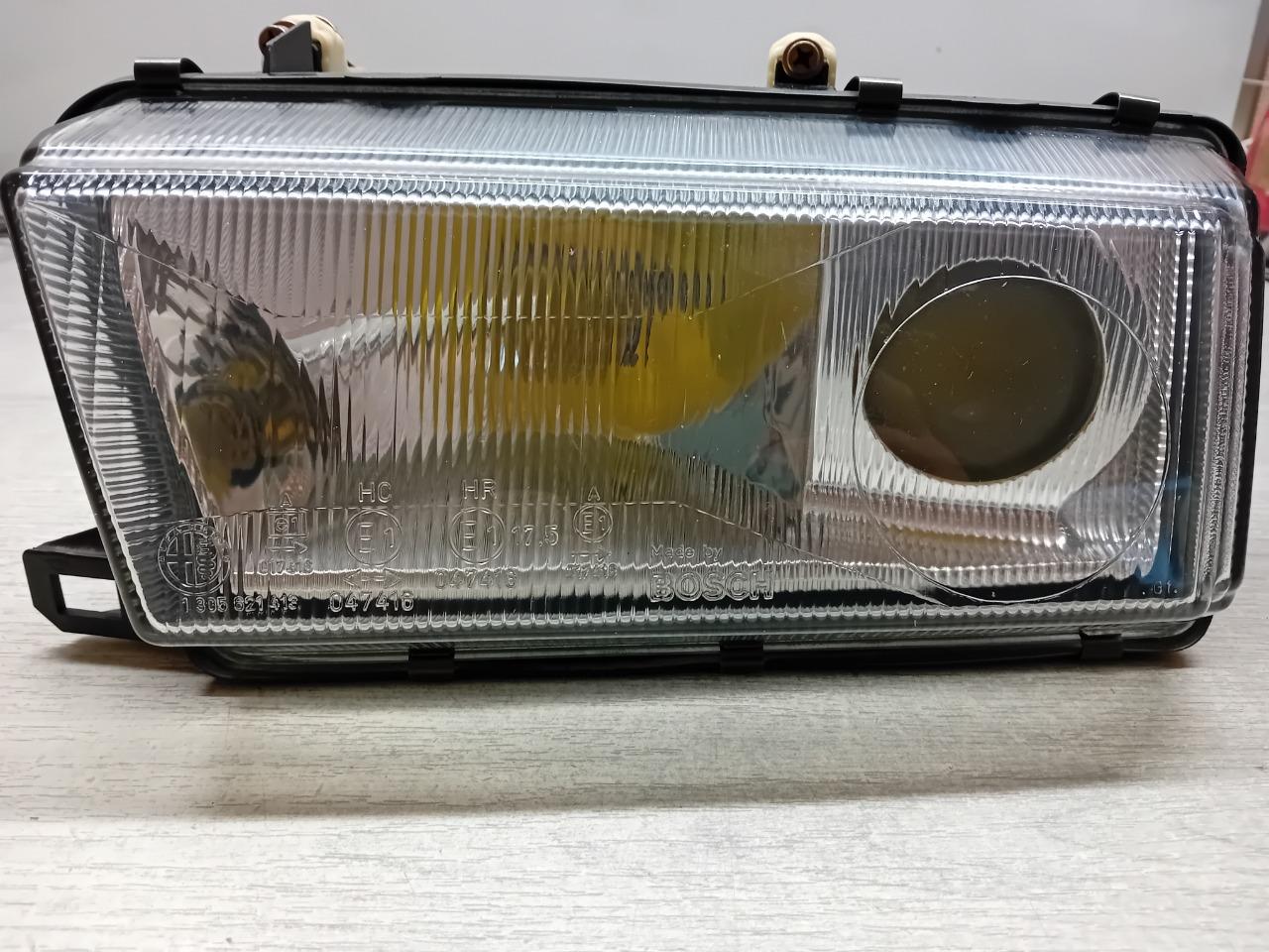 60556720 PHARE AVANT GAUCHE ALFA ROMEO 155 U5 LesAnciennes.com