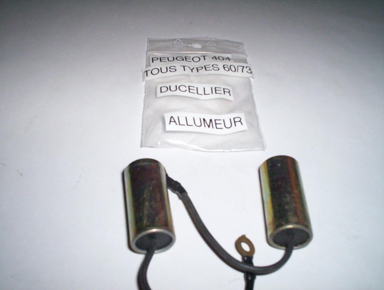 PEUGEOT 404 2 condensateurs neuf LesAnciennes.com