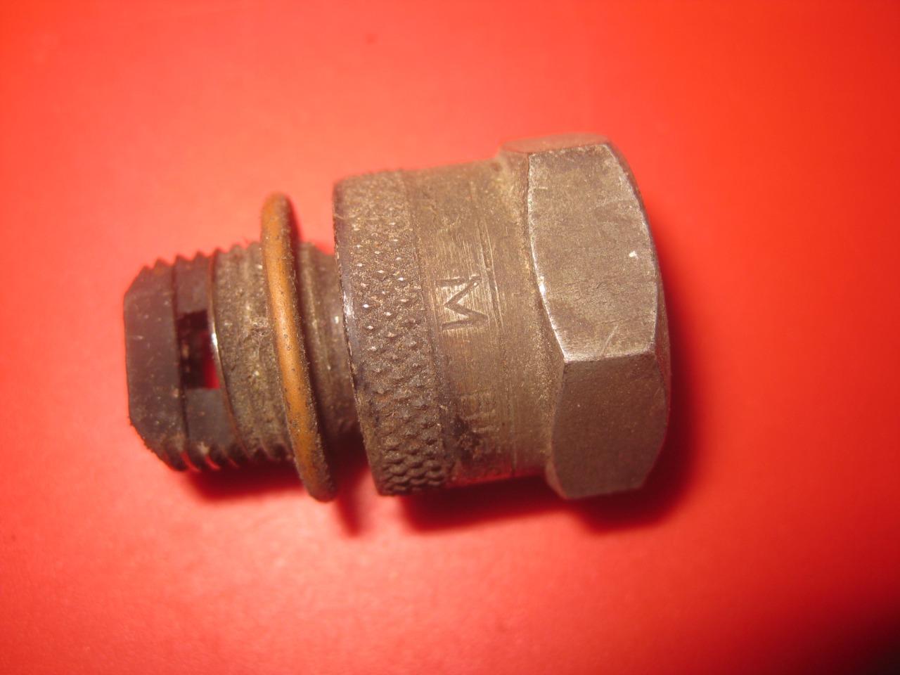 4 Culots bougie anti remontées huile LesAnciennes.com