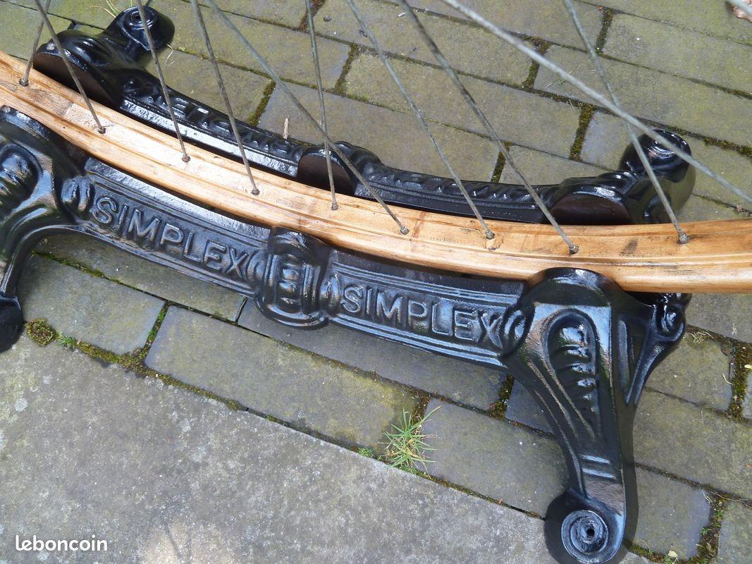 Support ancien cycle vélo bicyclette métal fonte LesAnciennes.com