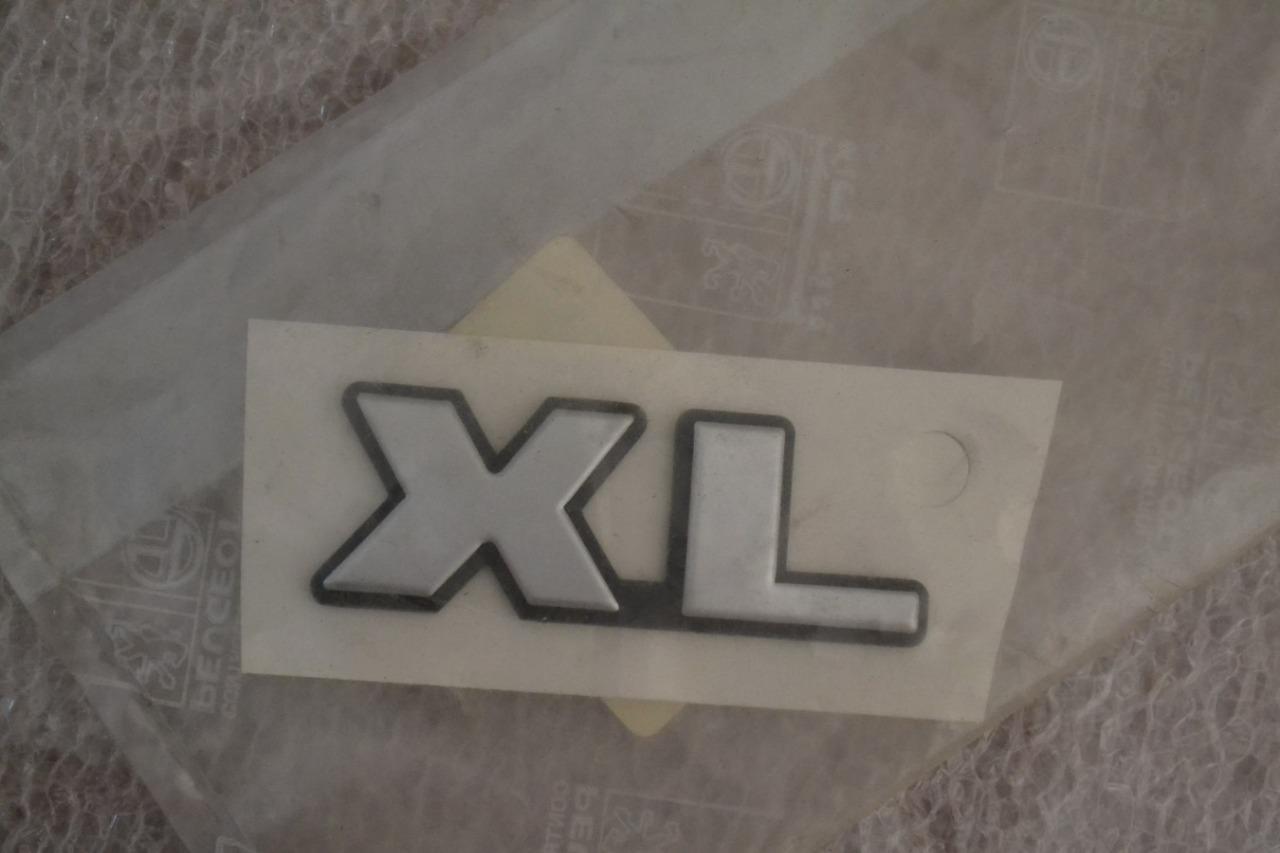 Monogramme "XL" PEUGEOT 306, neuf LesAnciennes.com