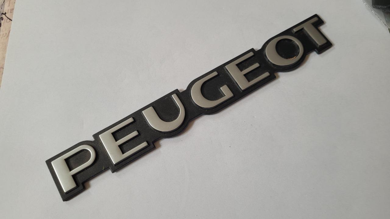 Logo monogramme PEUGEOT 205 GTI NEUF LesAnciennes.com
