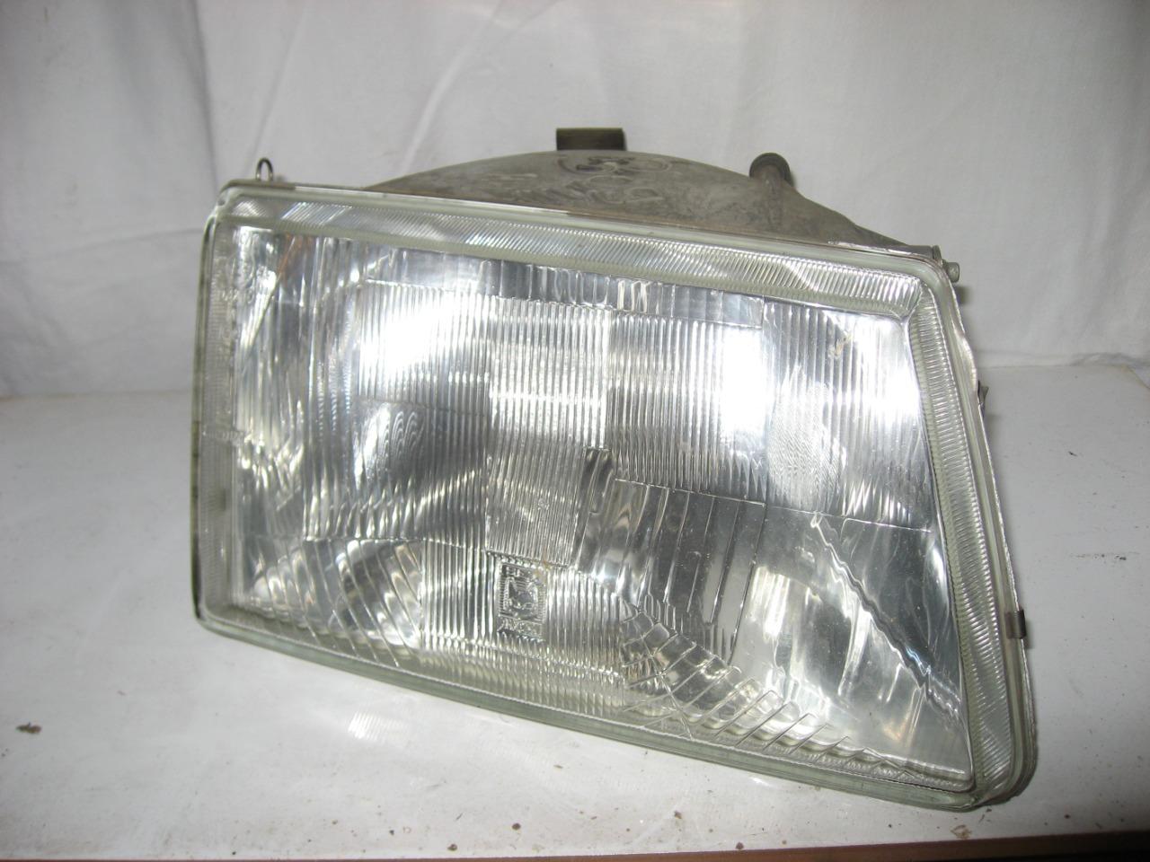 Optique de phare PEUGEOT 309 LesAnciennes.com