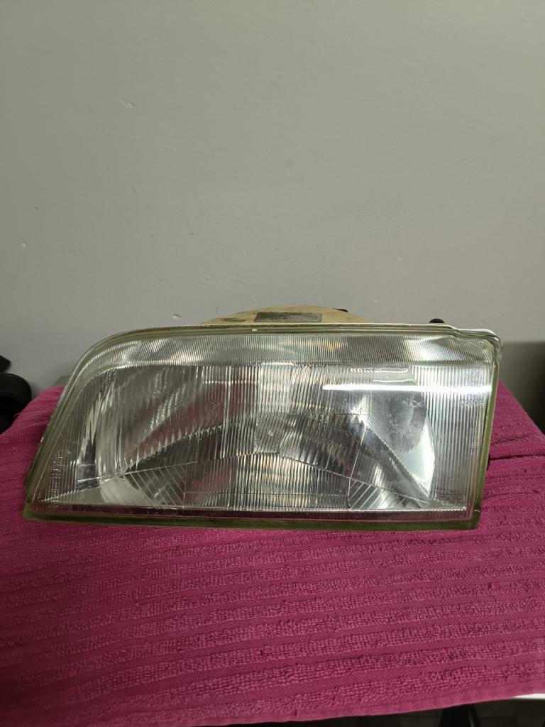Citroën ZX phare avant gauche LesAnciennes.com