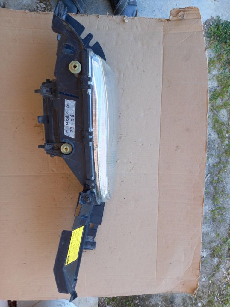 Phare G FORD Mondeo LesAnciennes.com